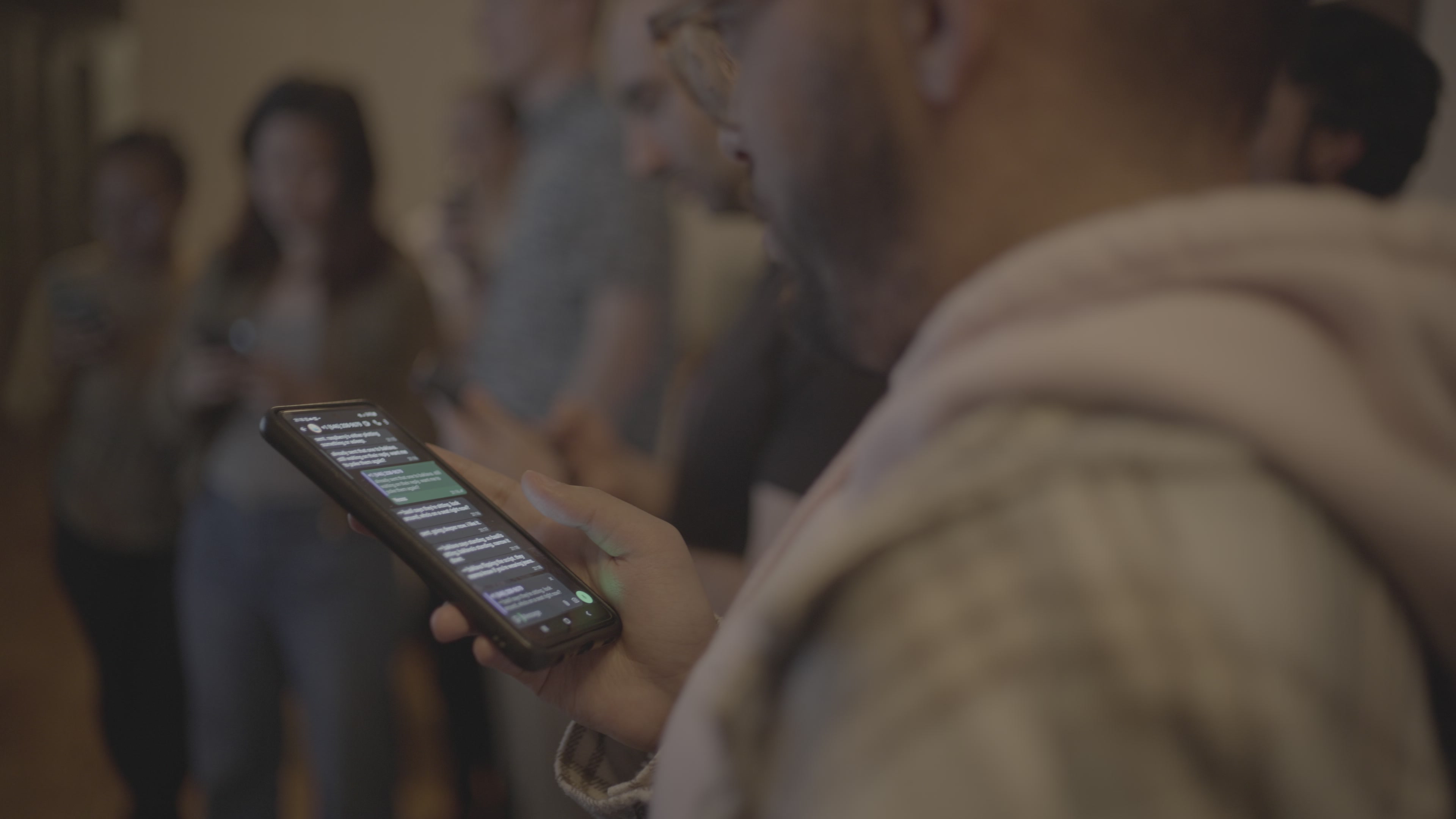 Close on a phone screen: the green game chat mid-round