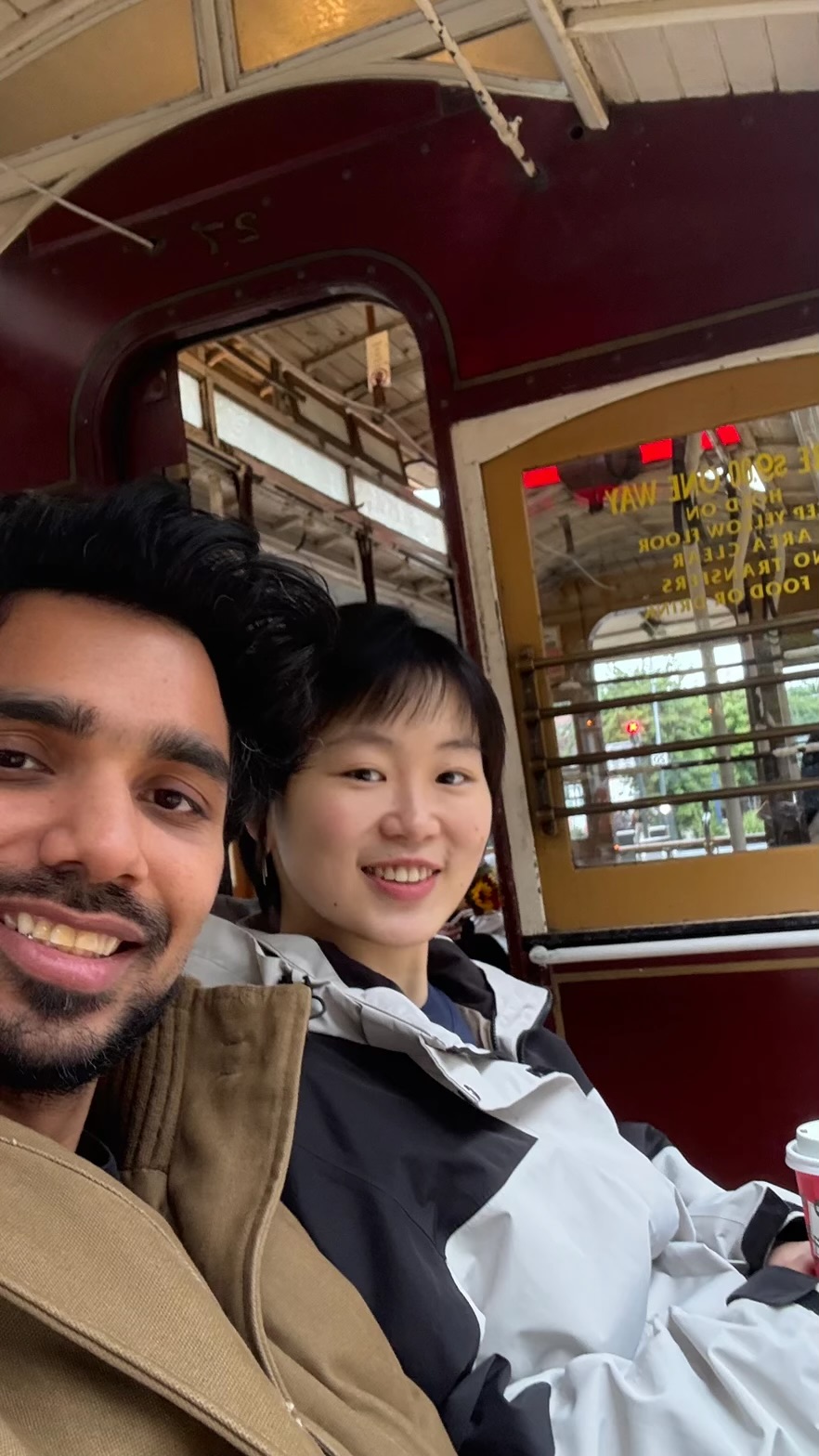 Rebecca and Shubham on a cable car, a close selfie